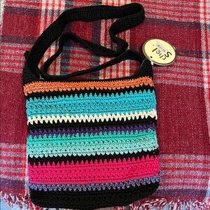 The Sak Black and Pink Hobo Bag with Bohemian Charm